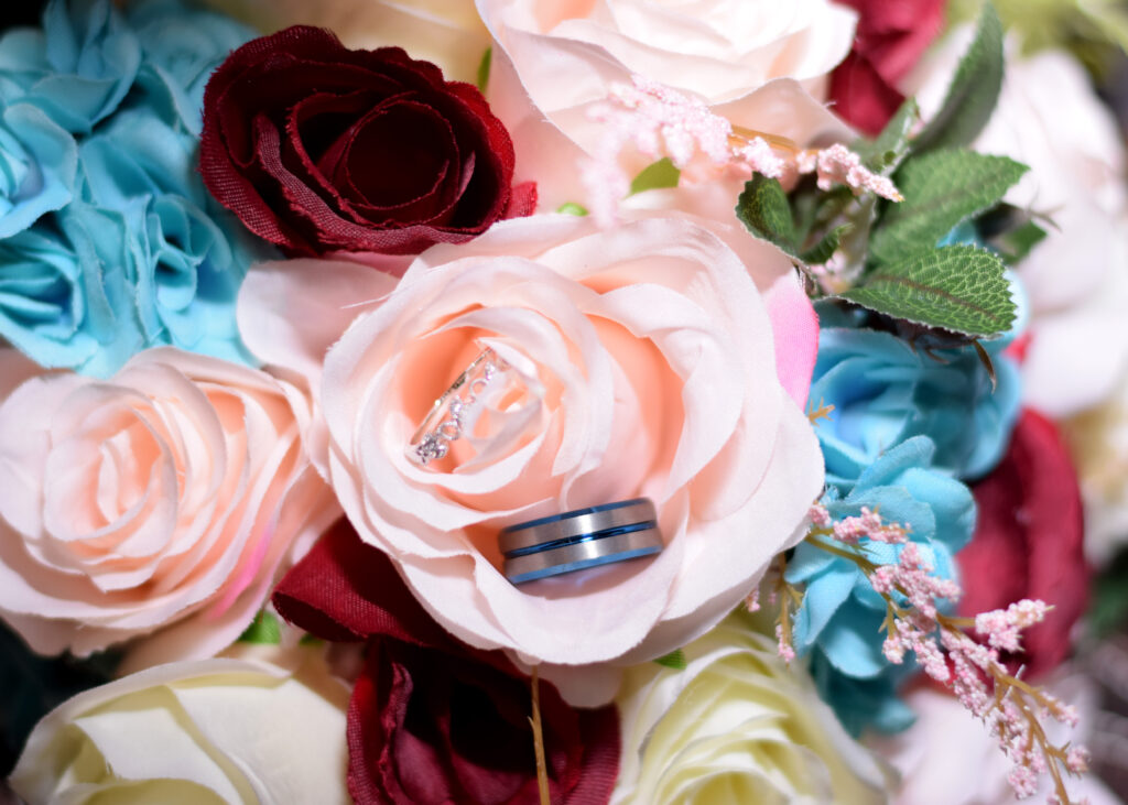 wedding photos; rings; bridal bouquet