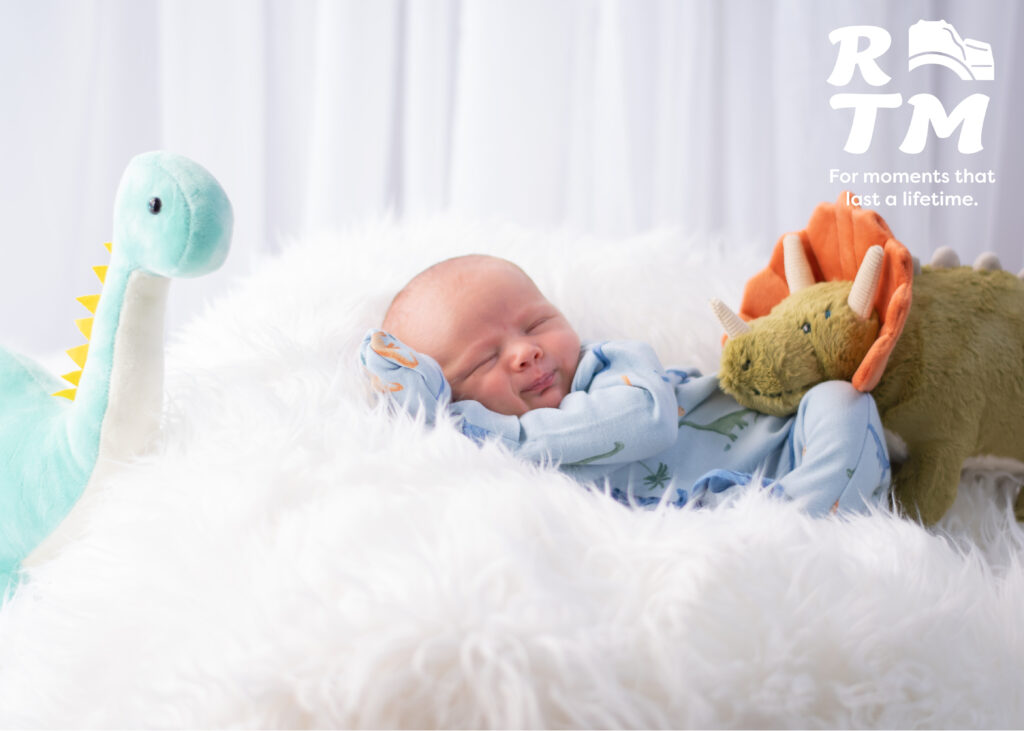 newborn baby photoshoot/ baby with his dinosaurs/ Arlington photographer